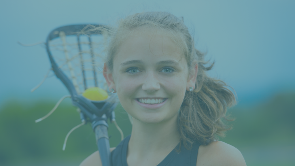 female lacrosse player with a lacrosse stick